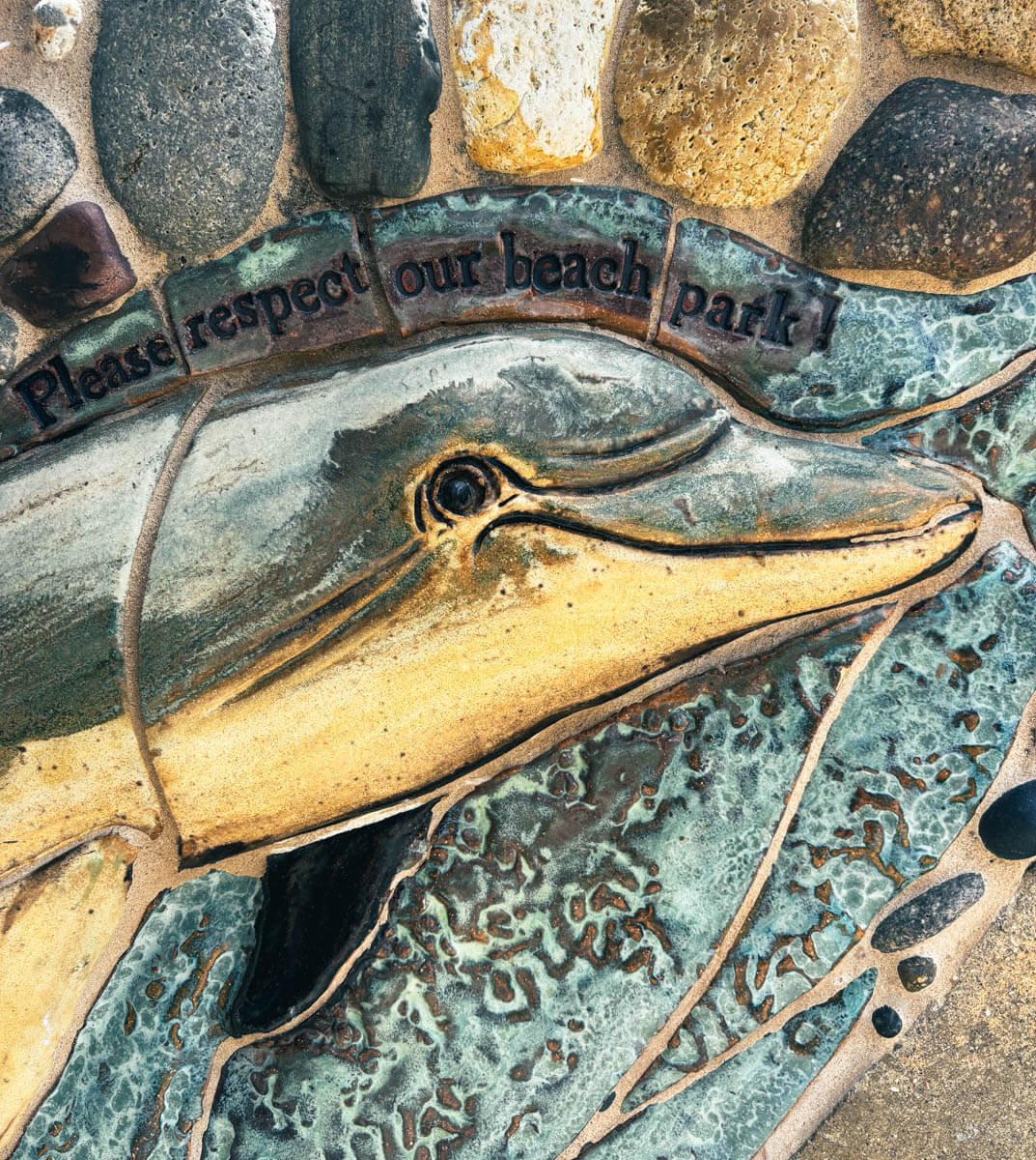 Ceramic dolphin mural by Betsy Schulz atFletcher Cove Beach Park, Solana Beach, California 